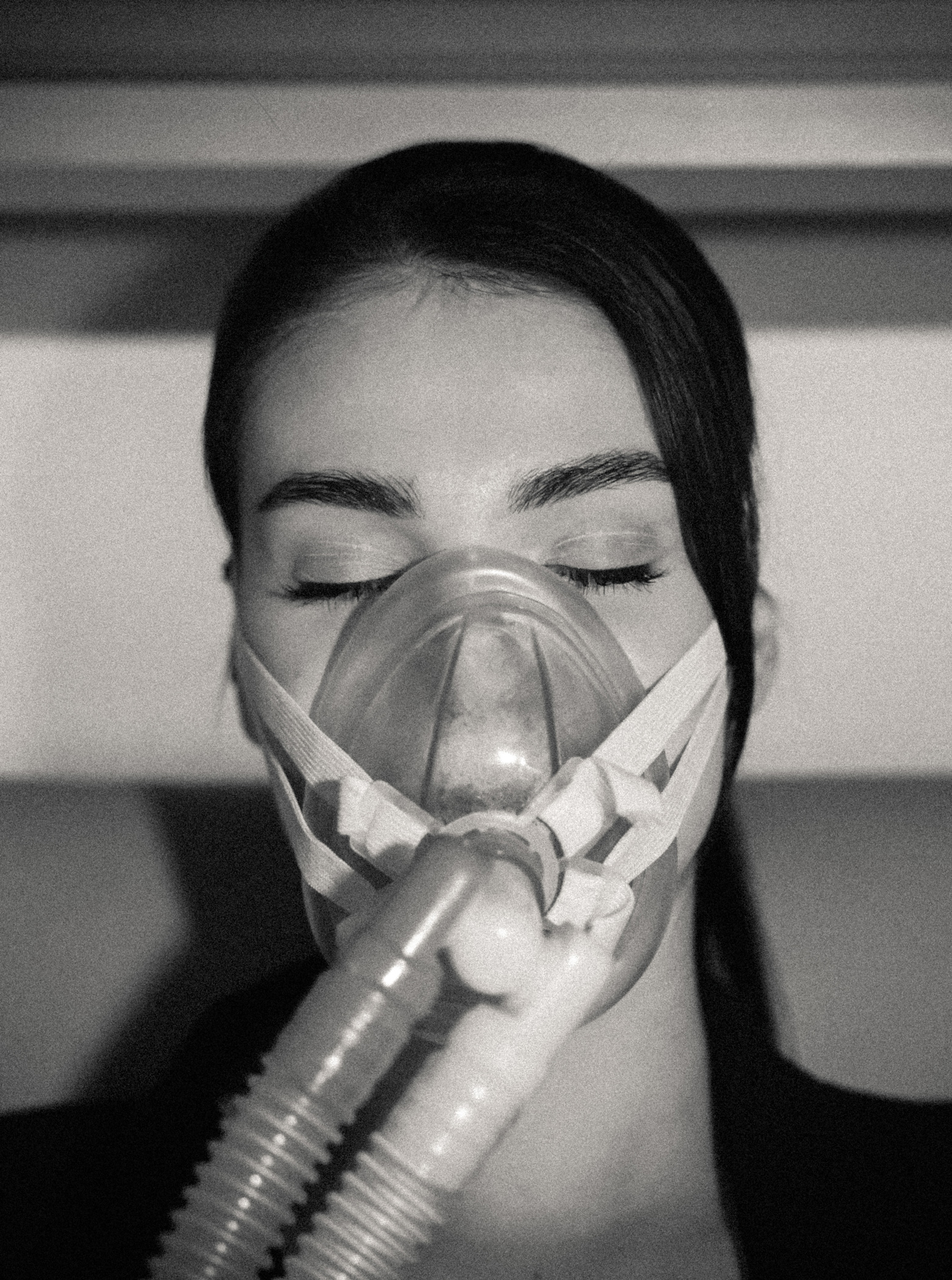 Woman Wearing a Face CPAP Mask